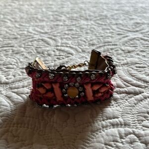 Fun vintage leather adjustable boho bracelet with chain closure.
